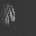 Extremely depressed, crying and distraught person