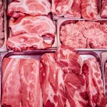 A full-filled with various meat products counter